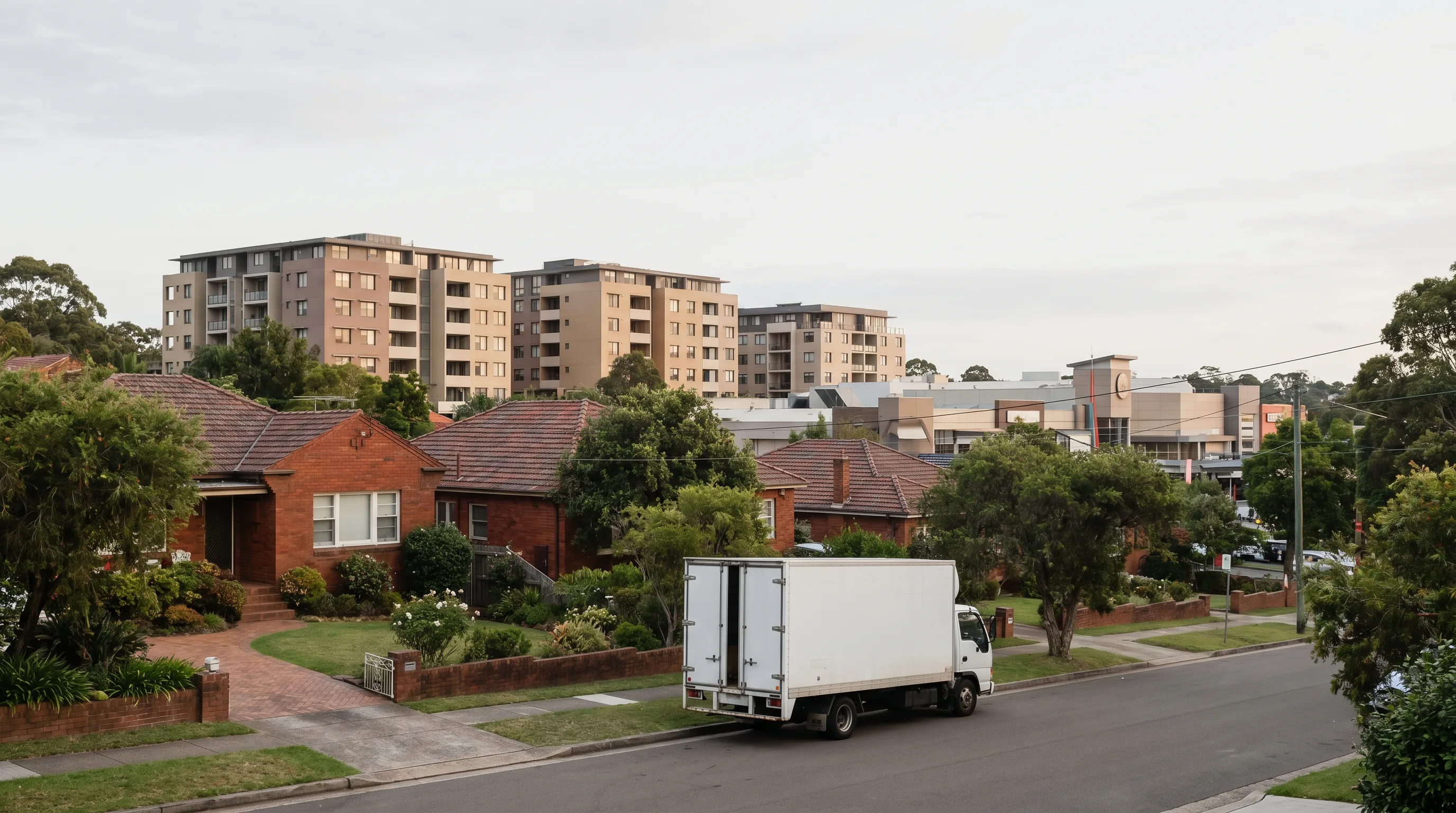 A street in Ryde, Northern Districts, with a removal truck